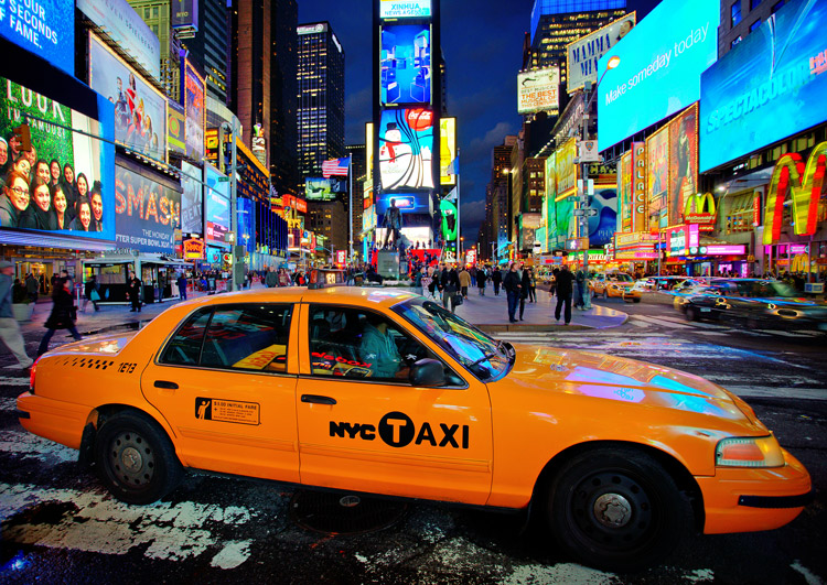 taxi in Times Square night photo