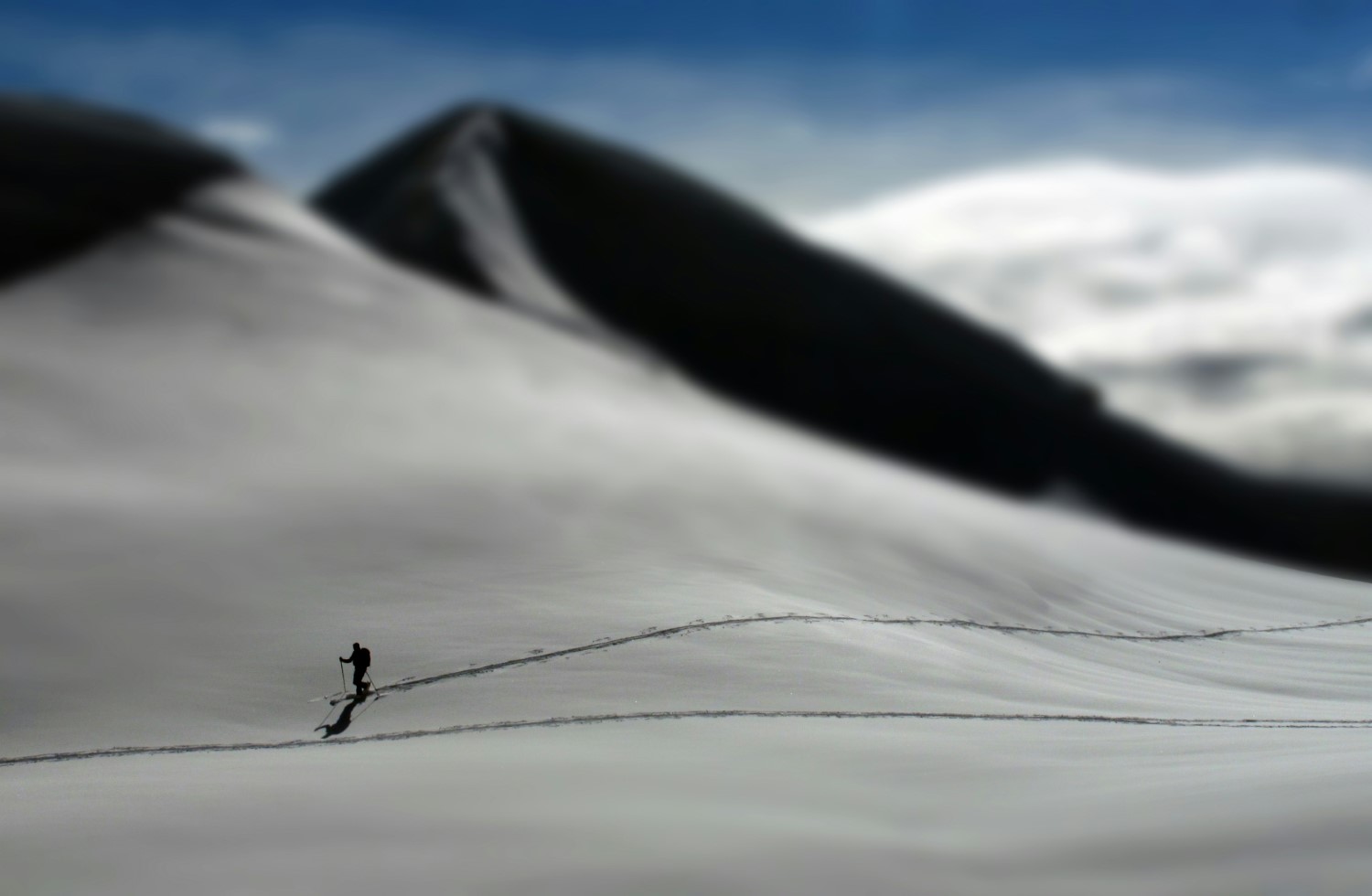 A tilt-shift photo example featuring a skier